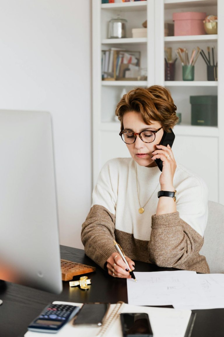 Freelancer working on her business in her home office